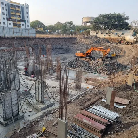 Excavation and foundation works with columns rising from the footings