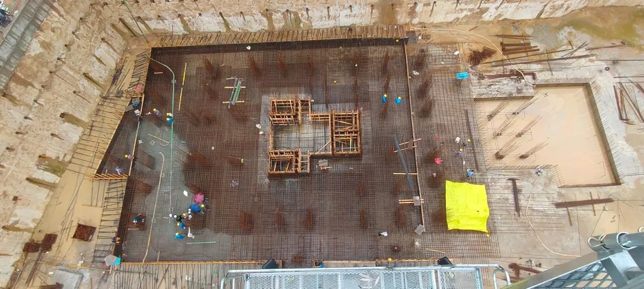 Foundation-stage rebar and RCC structural work at a Devmani Construction site
