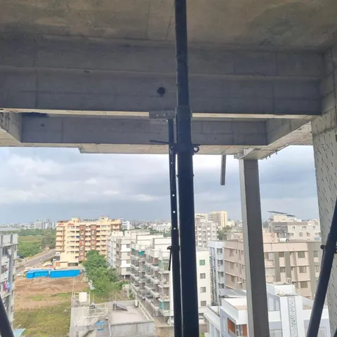 View from an upper floor through the concrete frame and props